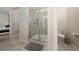 Bathroom with walk-in shower and toilet at 3131 Paradox Cir # 401, Kissimmee, FL 34746
