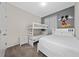 Bedroom with bunk beds and Mickey Mouse wall art at 3131 Paradox Cir # 401, Kissimmee, FL 34746