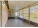 Enclosed sunroom with plenty of natural light and outdoor access at 33 W Country Cove Way, Kissimmee, FL 34743