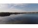 Serene lake view with clear reflection of the sky at 3412 Lake Diane Rd, Tavares, FL 32778