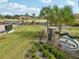 Gated community entrance with landscaping and signage for Hidden River Lakes at 3412 Lake Diane Rd, Tavares, FL 32778