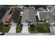Aerial view of a neighborhood with houses and pools at 507 Cassia Dr, Davenport, FL 33897