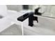 Contemporary black bathroom faucet with a modern design at 507 Cassia Dr, Davenport, FL 33897