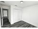 Bedroom with grey flooring and double door closet at 507 Cassia Dr, Davenport, FL 33897