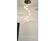 Contemporary chandelier with round shades at 507 Cassia Dr, Davenport, FL 33897