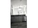 Modern kitchen island with double sink and stainless steel dishwasher at 507 Cassia Dr, Davenport, FL 33897