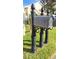 Gray metal mailboxes on decorative posts at 507 Cassia Dr, Davenport, FL 33897