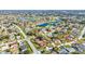 Neighborhood view showcasing various houses and a golf course at 508 Bar Dr, Kissimmee, FL 34759