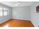 Simple bedroom with tiled floors and a window at 508 Bar Dr, Kissimmee, FL 34759