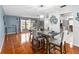 Bright dining room with a table and four chairs at 508 Bar Dr, Kissimmee, FL 34759