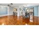 Open dining area with tile floors and modern table at 508 Bar Dr, Kissimmee, FL 34759
