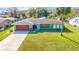 Ranch-style home with carport and spacious yard at 508 Bar Dr, Kissimmee, FL 34759