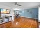 Living room with tile floors and built-in fireplace at 508 Bar Dr, Kissimmee, FL 34759