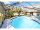 Inviting screened pool with patio at 508 Bar Dr, Kissimmee, FL 34759