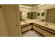 Double vanity bathroom with access to shower at 56 Buck Cir, Haines City, FL 33844