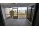 Screened patio overlooking grassy backyard at 56 Buck Cir, Haines City, FL 33844