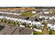 Aerial view of townhouses showcasing backyard and community features at 592 Madison Dr, Davenport, FL 33837