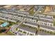 High-level aerial view of a townhome community and surrounding area at 592 Madison Dr, Davenport, FL 33837