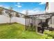 Private backyard with gazebo, hammock, and patio furniture at 592 Madison Dr, Davenport, FL 33837
