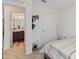 Bedroom with full bed, and access to bathroom at 592 Madison Dr, Davenport, FL 33837