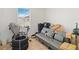 Bedroom with sofa bed, exercise bike, and plenty of storage at 592 Madison Dr, Davenport, FL 33837