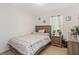 Bedroom with full bed and wooden night stand at 592 Madison Dr, Davenport, FL 33837