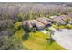 Aerial view of house and surrounding neighborhood at 601 Carmel Ln, Kissimmee, FL 34759