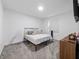 Bright bedroom with carpeted floors and ample natural light at 6308 Chirpine Ln, St Cloud, FL 34771