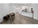 Kitchen features a breakfast bar and modern appliances at 6308 Chirpine Ln, St Cloud, FL 34771