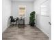 Bright home office features desk and chair at 6308 Chirpine Ln, St Cloud, FL 34771