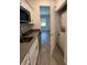 Small kitchen with stainless steel appliances at 6308 Chirpine Ln, St Cloud, FL 34771