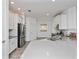 Modern kitchen with a large island and stainless steel appliances at 6308 Chirpine Ln, St Cloud, FL 34771
