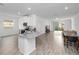 Open living area with sliding glass doors leading to backyard at 6308 Chirpine Ln, St Cloud, FL 34771
