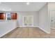 Bright dining room with tile flooring and glass doors leading to the outside at 6921 Cupseed Ln, Harmony, FL 34773