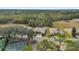 Aerial view showing community features including homes and a basketball court at 760 Lake Marion Golf Resort, Poinciana, FL 34759