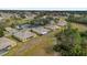 Aerial view of community with villas and green spaces at 760 Lake Marion Golf Resort, Poinciana, FL 34759