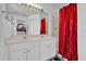 Double sink bathroom with large mirror at 760 Lake Marion Golf Resort, Poinciana, FL 34759