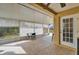 Inviting screened lanai with tile floors, perfect for relaxing and enjoying the outdoor view at 760 Lake Marion Golf Resort, Poinciana, FL 34759