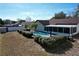 Large backyard with a swimming pool, providing ample outdoor space at 8079 Cloverglen Cir, Orlando, FL 32818