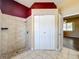 Bathroom with shower and linen closet at 8079 Cloverglen Cir, Orlando, FL 32818