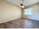 Room with wood-look flooring and a window with a view at 8079 Cloverglen Cir, Orlando, FL 32818