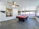 Relaxing game room with a pool table, perfect for entertainment at 8079 Cloverglen Cir, Orlando, FL 32818