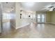 Combined kitchen and dining area with tile floors and access to a Florida room at 8079 Cloverglen Cir, Orlando, FL 32818