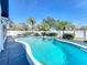 Inviting swimming pool with a spa in a fenced backyard at 8079 Cloverglen Cir, Orlando, FL 32818
