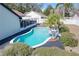 Relaxing kidney-shaped pool with a spacious deck at 8079 Cloverglen Cir, Orlando, FL 32818