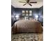 Large bedroom with a king-size bed and neutral decor at 825 E Lakeshore Blvd, Kissimmee, FL 34744