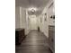 Bright hallway with built-in shelving and gray flooring at 825 E Lakeshore Blvd, Kissimmee, FL 34744