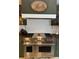 Stainless steel range with pot filler and white herringbone backsplash at 825 E Lakeshore Blvd, Kissimmee, FL 34744