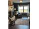 Cozy living room with fireplace and rocking chair at 825 E Lakeshore Blvd, Kissimmee, FL 34744