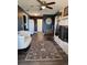 Spacious living room with fireplace and hardwood floors at 825 E Lakeshore Blvd, Kissimmee, FL 34744